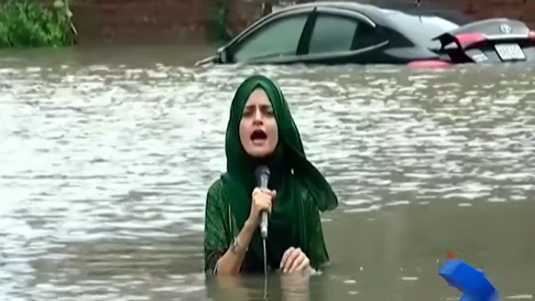 Female reporter risks her life in knee-high rainwater to document rain havoc in Lahore
