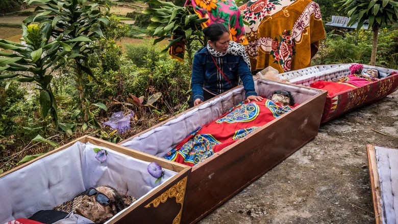 Torajans of Indonesia regularly clean and dress their deceased family members in unique burial rituals