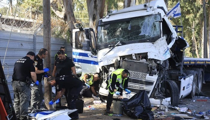 Six killed, dozens injured as truck driver rams into bus stop in Israel's Tel Aviv
