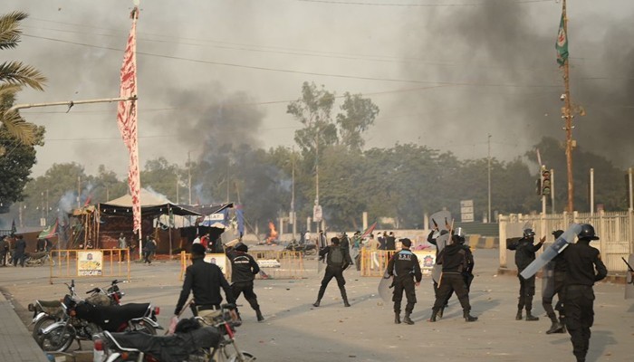 Over 300 booked for clashing with police at Numaish Chowrangi