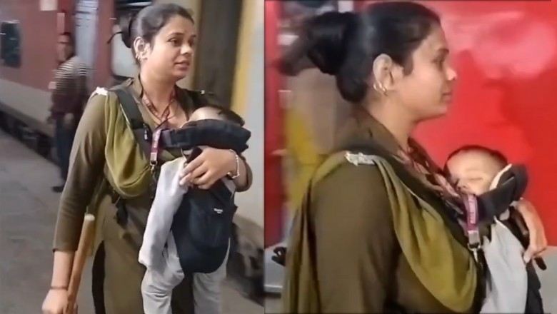 Female constable manages crowd at Delhi railway station while carrying baby