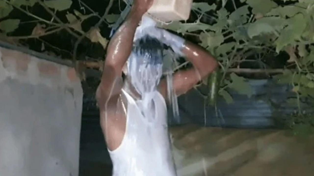 Man celebrates divorce by bathing in milk