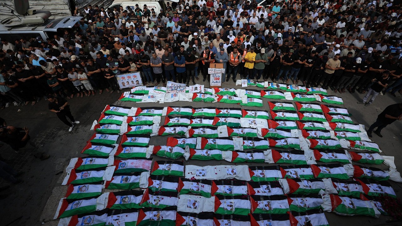 100 Palestinians, including 70 children, buried after mass funeral in Gaza