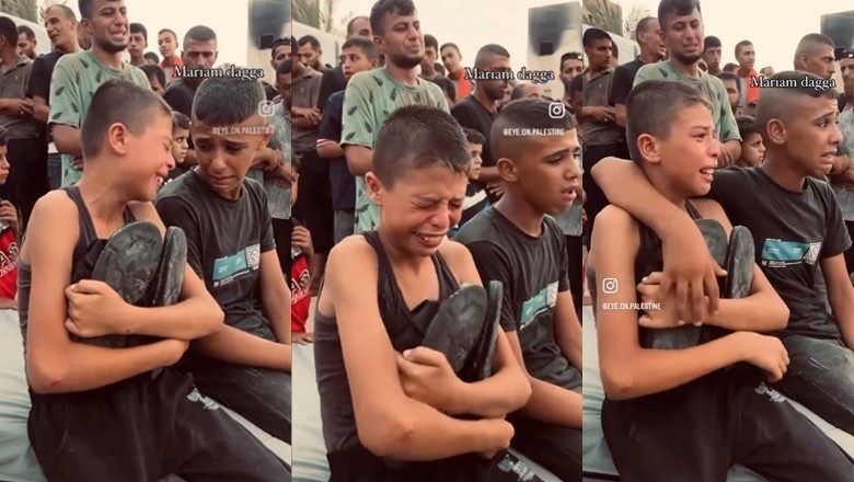 فلسطینی بچہ شہید والد کے جوتے سینے پر لگا کر زار و قطار رو دیا