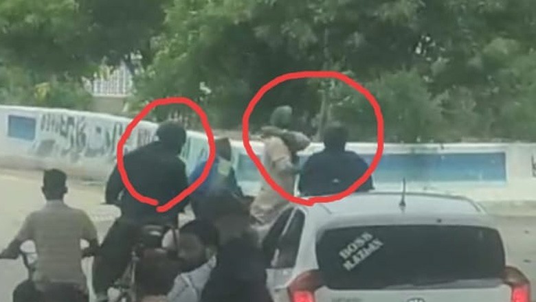 کراچی کی مصروف شاہراہ پر دن دہاڑے ڈکیتی